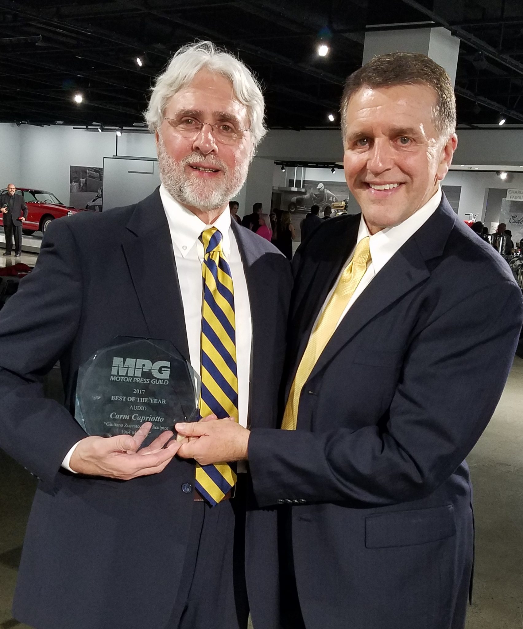 MPG Award Carm Capriotto & Steve Ford 2 Carm receiving the MPG Audio of the Year 2017 Honor from Steve Ford